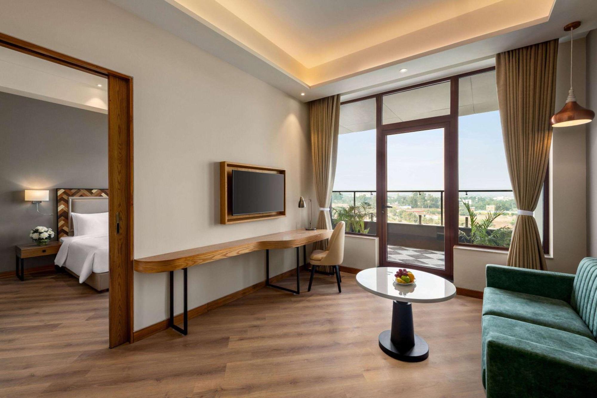 Ramada Encore By Wyndham Amritsar Airport Exterior photo